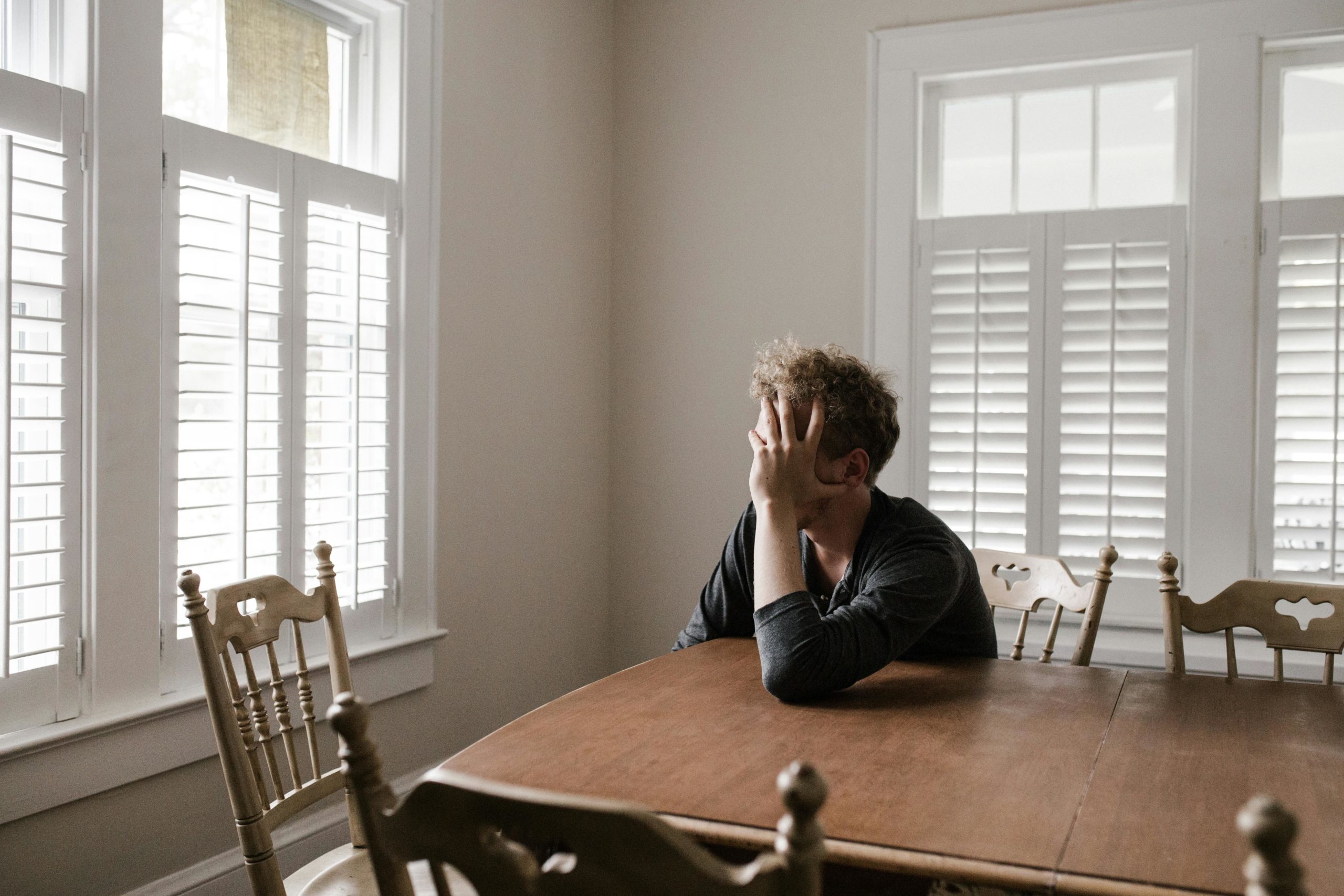 Man struggling with feelings of hopelessness, despair